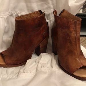 Heels wooden by bed|stu